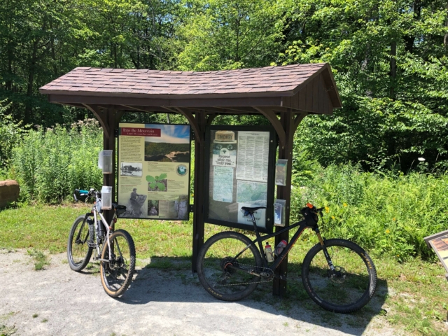 Laurel Highlands Gravel Routes Collection - Summit Sign Lean